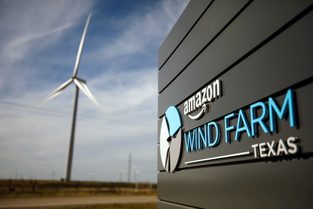 RIOT, NYC Creative Agency: Amazon Wind Farm sign in Texas with turbine in the background. Amazon Wind Farm sign in Texas with turbine in the background.