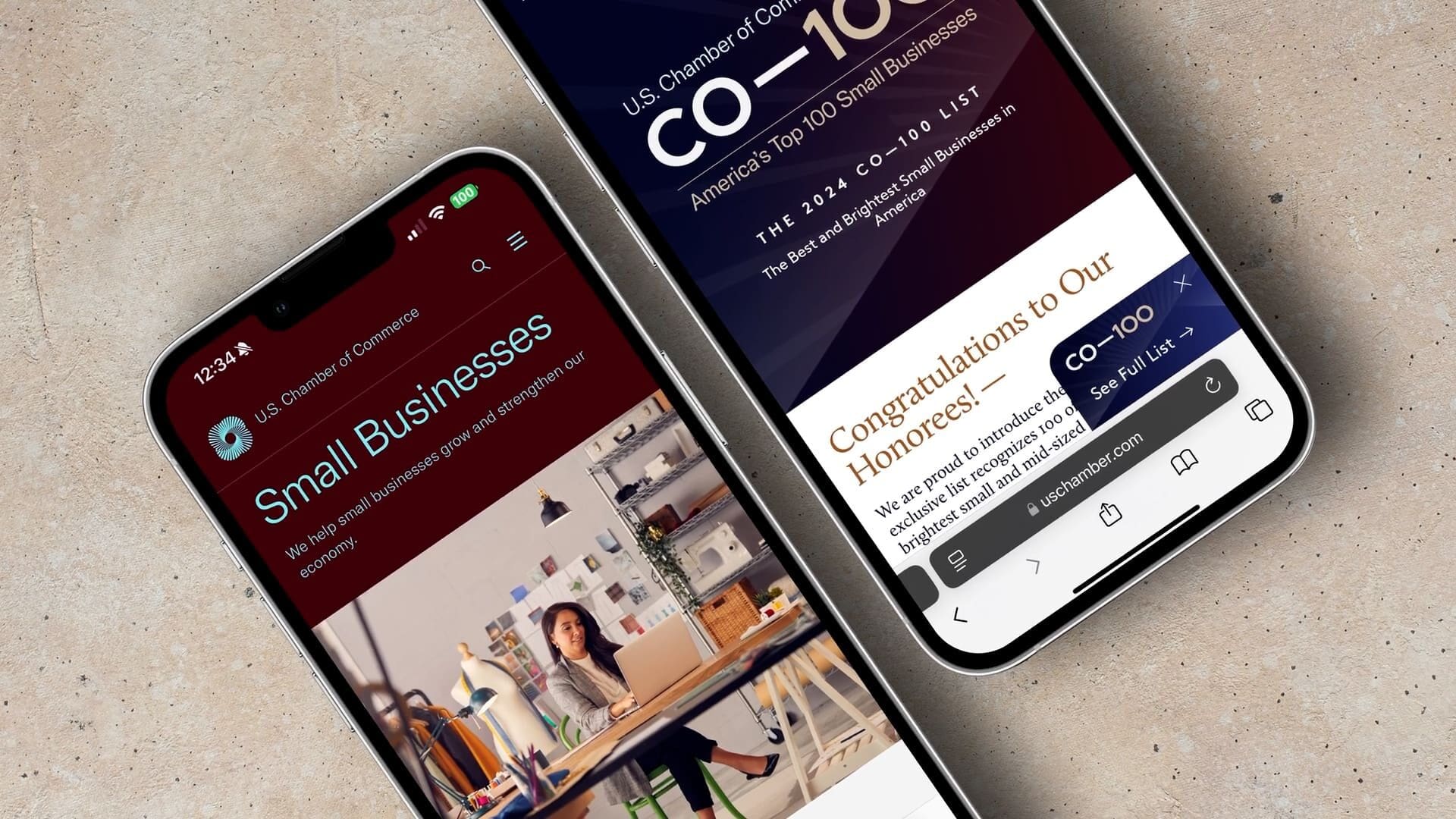 Two mobile phones displaying the U.S. Chamber of Commerce small business and CO—100 web pages