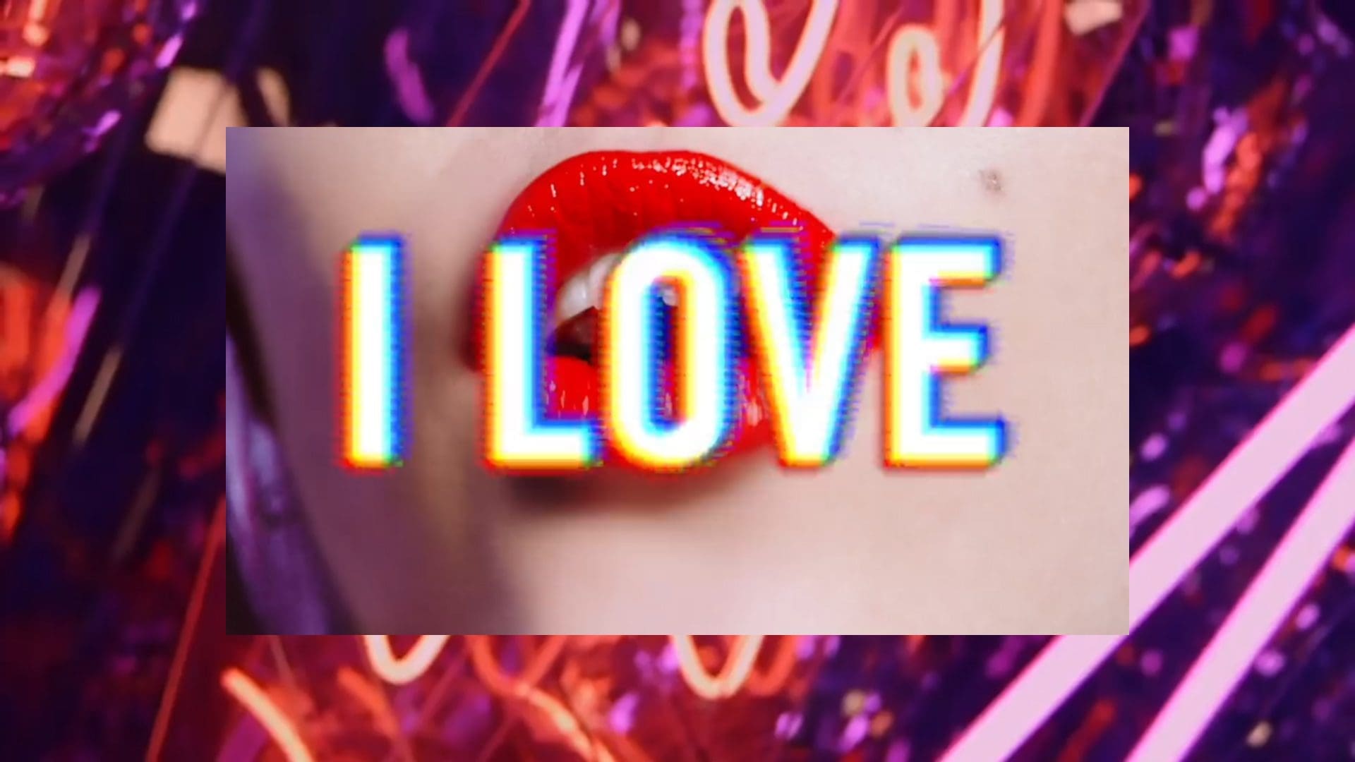 Screengrab from the Estée Lauder Companies "I Love" campaign film featuring bold red lips and vibrant neon text.