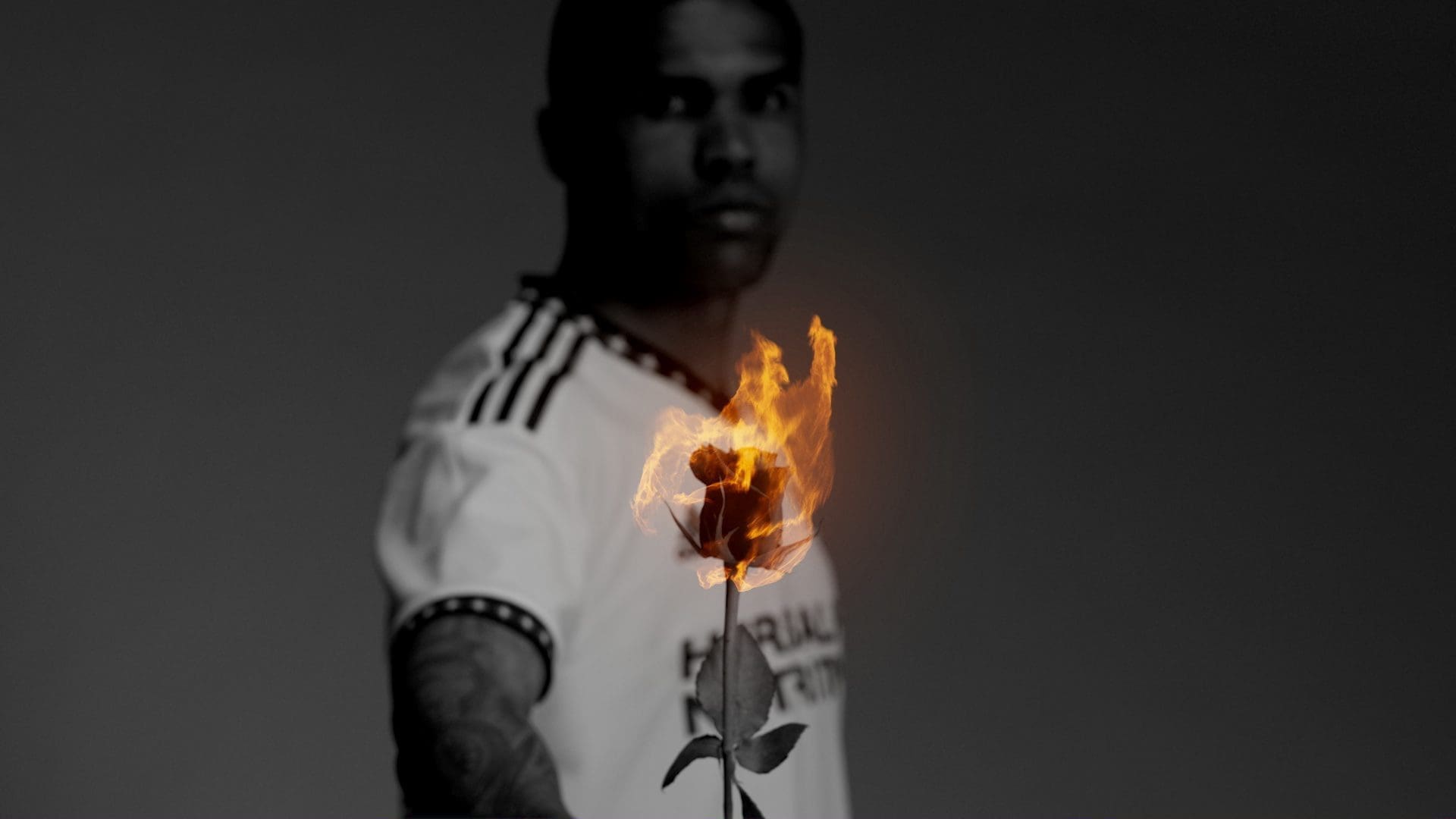 RIOT, NYC Creative Agency: Douglas Costa of LA Galaxy holding a flaming rose, representing the passion and intensity of the Rose Bowl Stadium campaign. Douglas Costa of LA Galaxy holding a flaming rose, representing the passion and intensity of the Rose Bowl Stadium campaign.