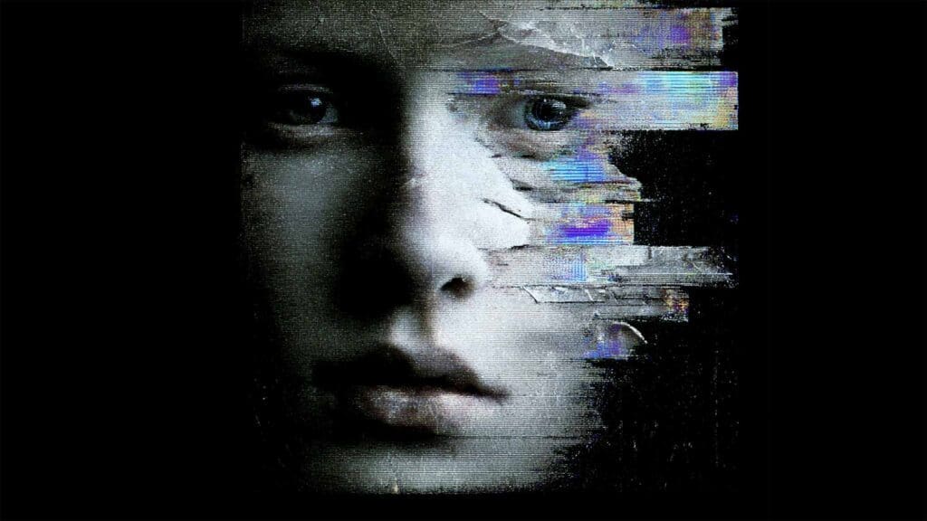Glitched portrait of a human face dissolving into static and digital fragments