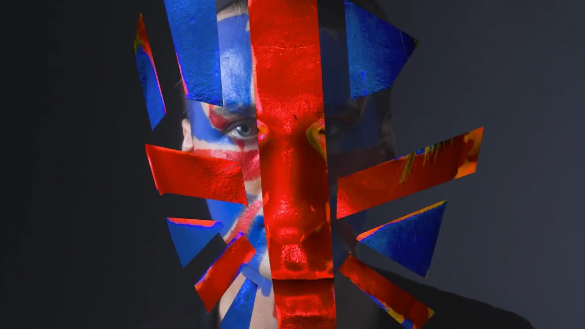 RIOT, NYC Creative Agency: Gareth Pugh with his face painted in Union Jack colors, showcasing a punk-inspired design as part of his collaboration with Sunglass Hut. Gareth Pugh with his face painted in Union Jack colors, showcasing a punk-inspired design as part of his collaboration with Sunglass Hut.