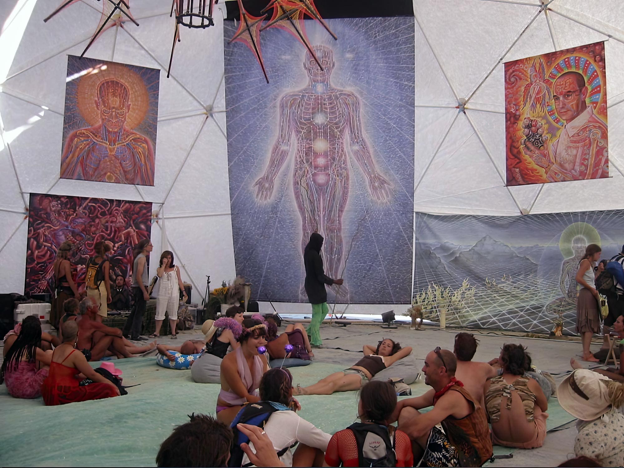 RIOT, NYC Creative Agency: Participants gather at COSM beneath Alex Gray’s visionary artwork, exploring consciousness and spirituality. Participants gather at COSM beneath Alex Gray’s visionary artwork, exploring consciousness and spirituality.