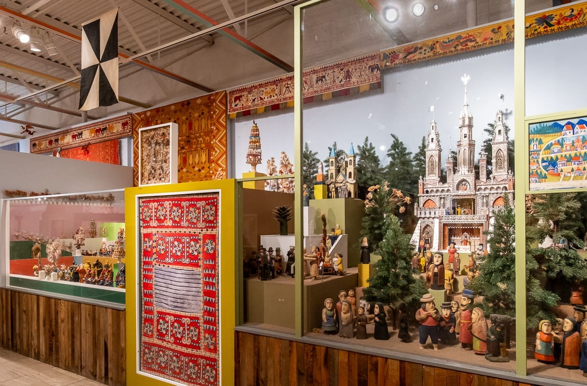 Exhibition view of the Girard Wing at the Museum of International Folk Art showcasing folk art displays