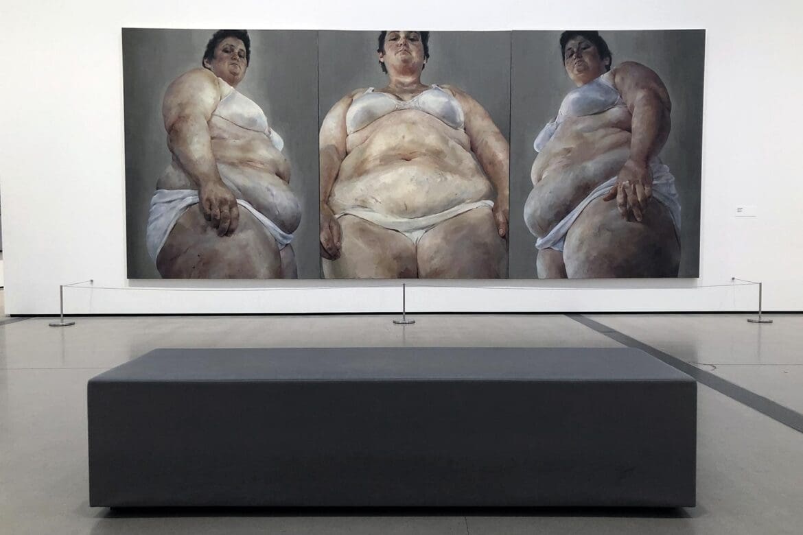 Jenny Saville’s triptych painting on display at The Broad museum, depicting fleshy, fragmented human forms