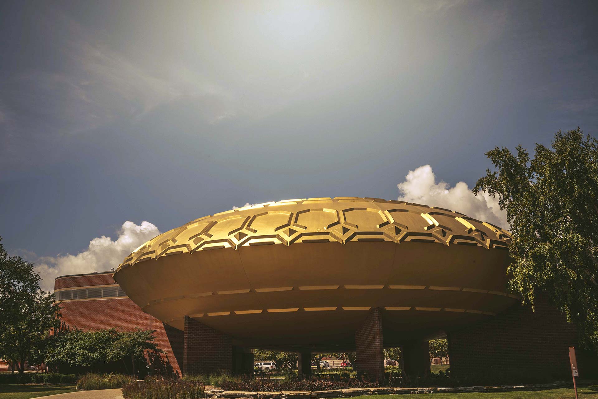 The Johnson Wax Golden Rondelle Pavilion in Racine, Wisconsin, a circular golden structure designed by Frank Lloyd Wright as part of the SC Johnson campus.