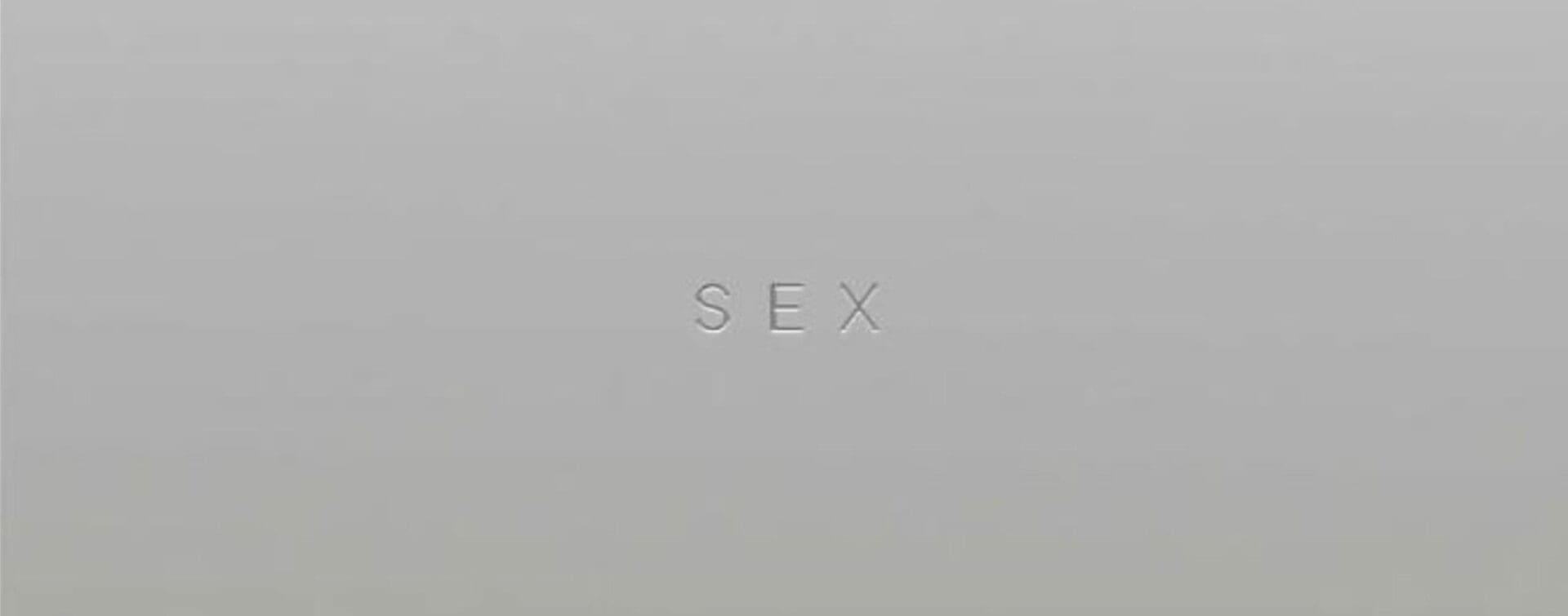 Madonna Sex Book Cover — Hero Image Minimalist metallic cover of Madonna’s 1992 Sex book with the word “SEX” embossed in the center.