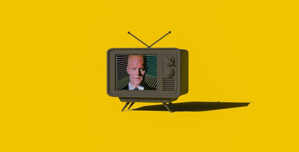 RIOT, NYC Creative Agency: Max Headroom on a retro TV screen with a yellow background. Max Headroom on a retro TV screen with a yellow background.