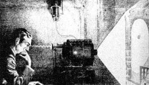 RIOT, NYC Creative Agency: An illustration of Nikola Tesla sitting beside his theoretical Thought Camera, designed to capture human thoughts and project them as images. An illustration of Nikola Tesla sitting beside his theoretical Thought Camera, designed to capture human thoughts and project them as images.