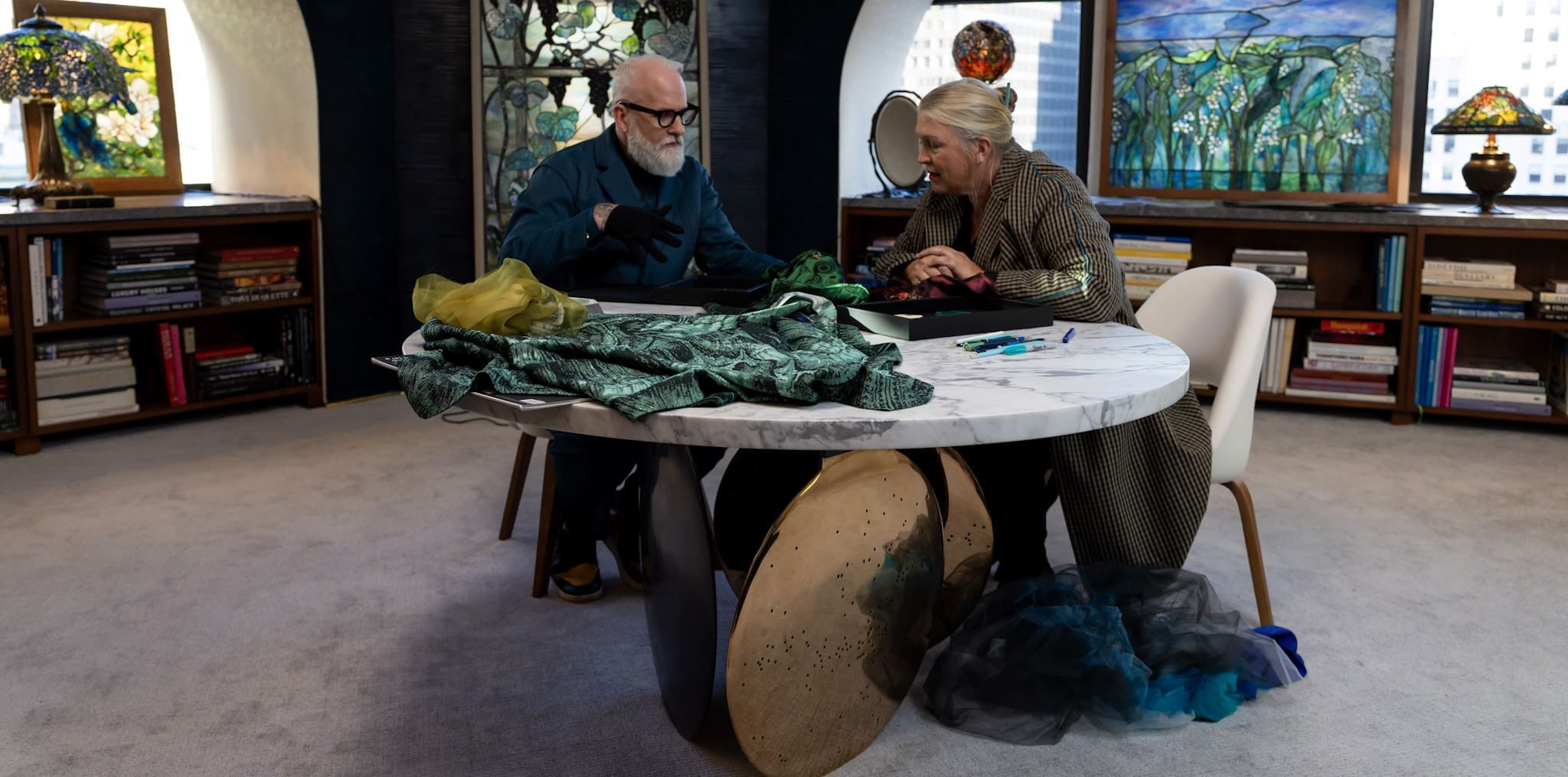 RIOT, NYC Creative Agency: Christopher Young and Kate Hawley collaborate in Tiffany’s staged archives, surrounded by stained glass and Tiffany lamps, photographed for Tiffany x Frankenstein by RIOT. Christopher Young and Kate Hawley collaborate in Tiffany’s staged archives, surrounded by stained glass and Tiffany lamps, photographed for Tiffany x Frankenstein by RIOT.