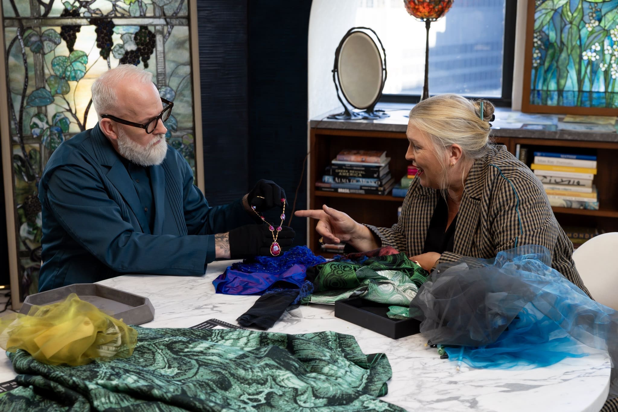 RIOT, NYC Creative Agency: Christopher Young shows Kate Hawley an archival Tiffany necklace during their creative collaboration for Tiffany x Frankenstein, photographed by RIOT. Christopher Young shows Kate Hawley an archival Tiffany necklace during their creative collaboration for Tiffany x Frankenstein, photographed by RIOT.