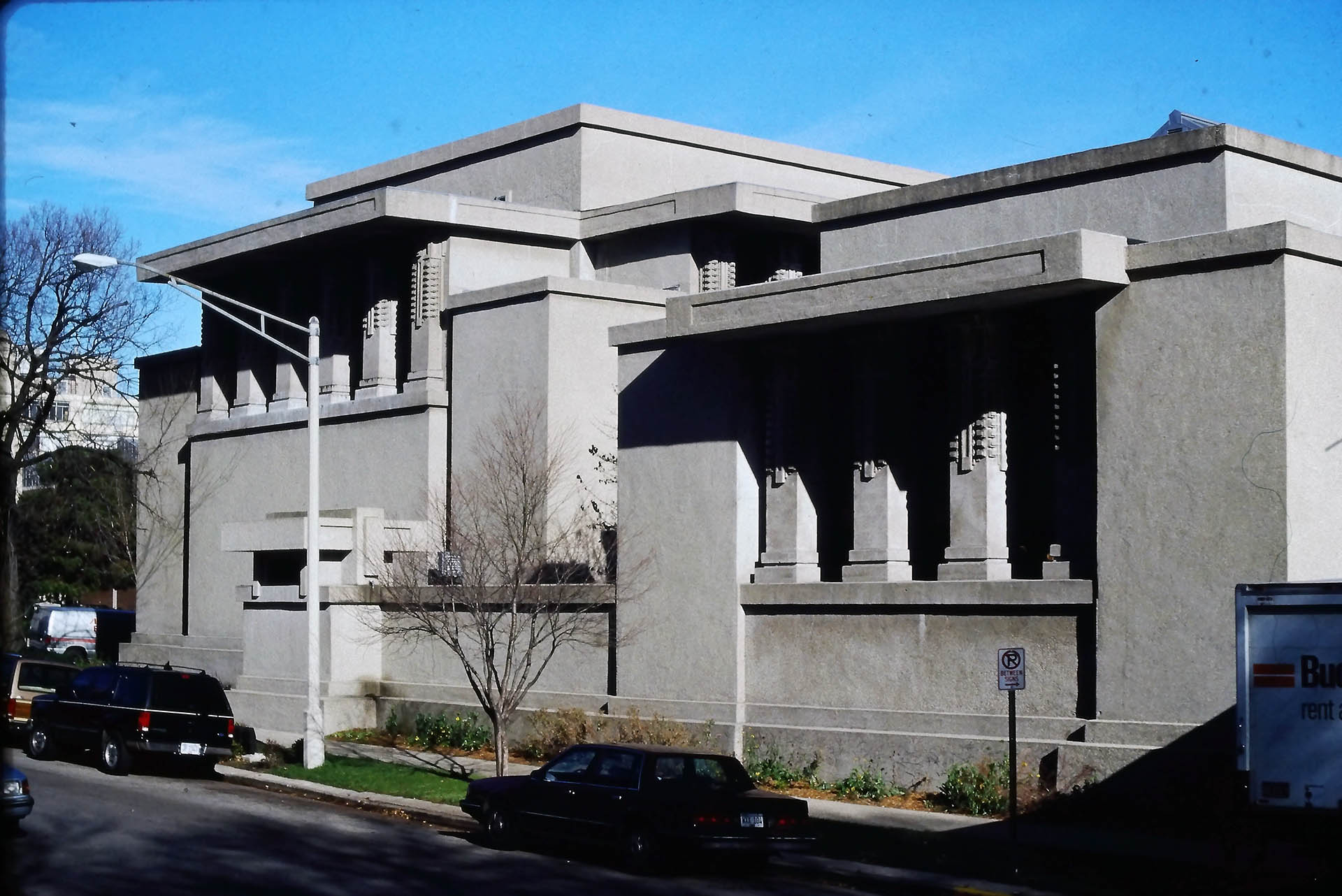 Unity Temple in Oak Park, Illinois, designed by Frank Lloyd Wright, showcasing its concrete exterior and geometric design.