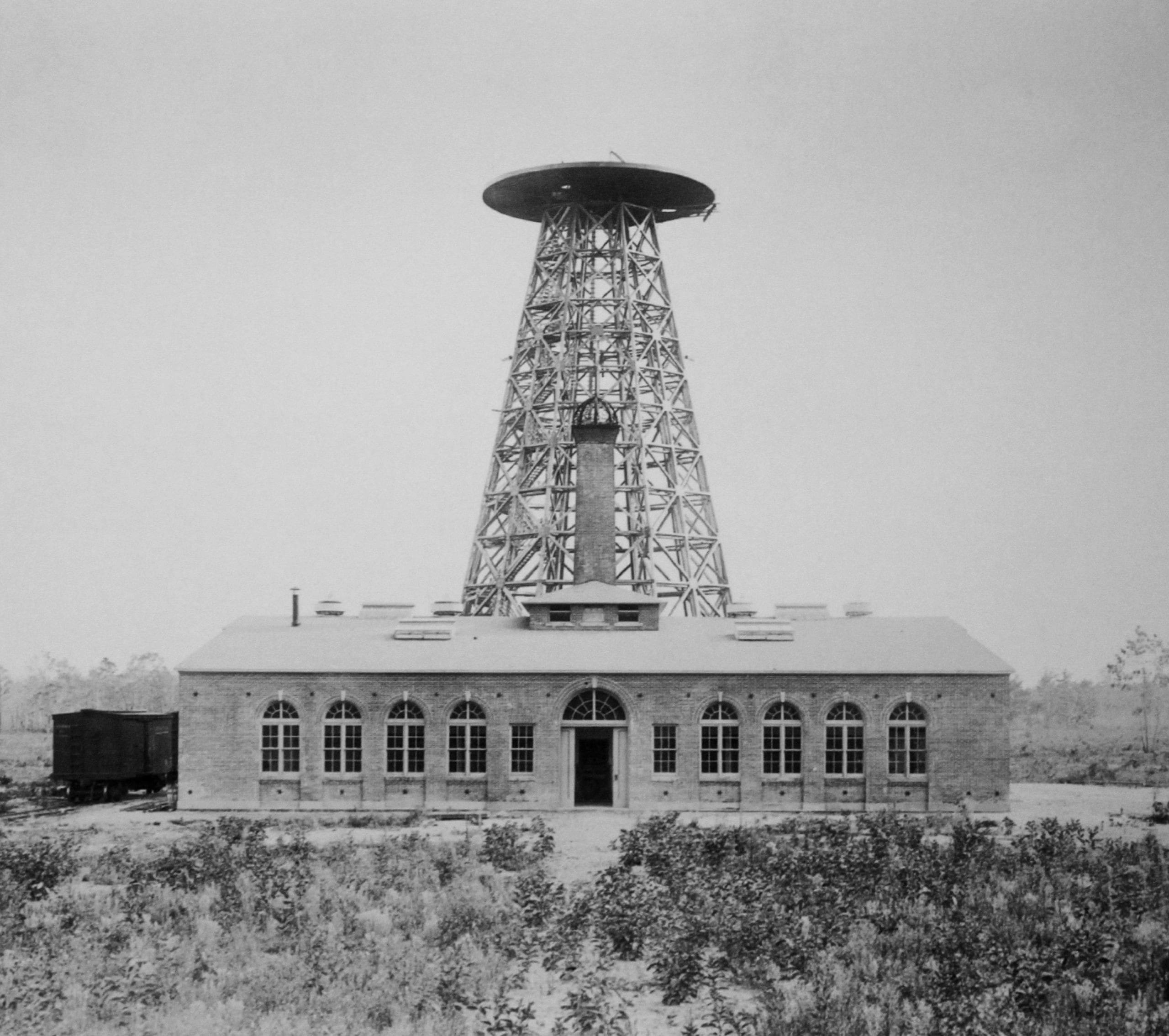 A historic photograph of Wardenclyffe Tower, Nikola Tesla’s wireless energy transmission tower.